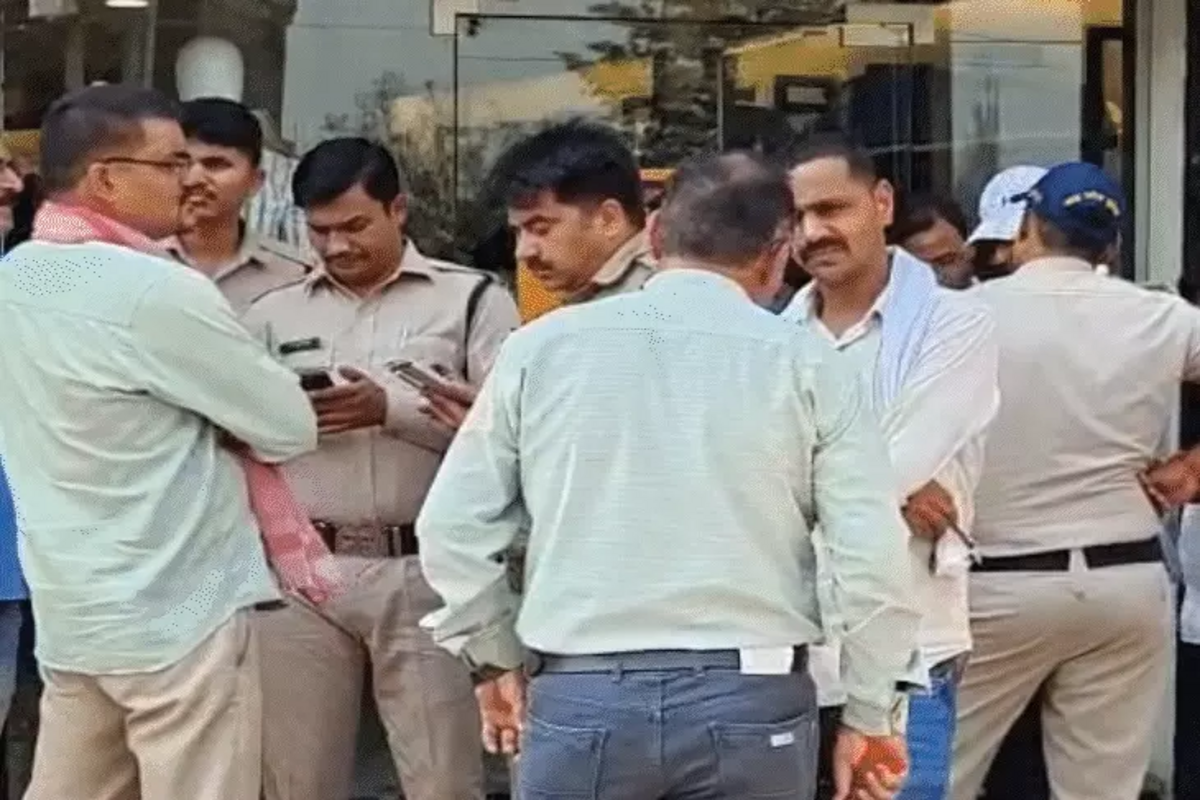 People gather at the bank post-incident